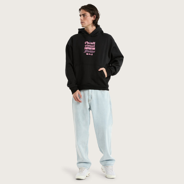 Model wears Occult Oversized Hoodie Jet Black Hoodies in Black - Image 2