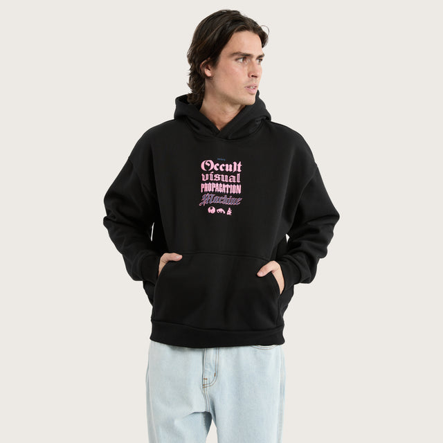 Model wears Occult Oversized Hoodie Jet Black Hoodies in Black - Image 3