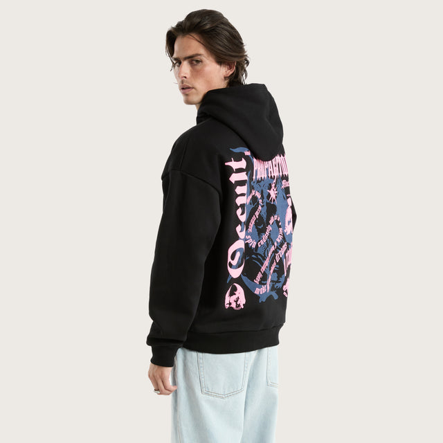 Model wears Occult Oversized Hoodie Jet Black Hoodies in Black - Image 4