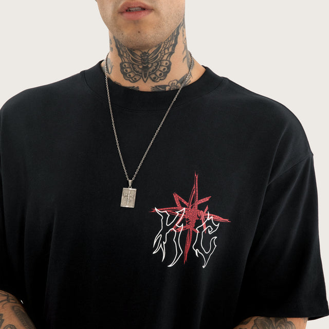 Model wears Coven Box Fit Tee in Jet Black T-Shirts in Black - Image 5