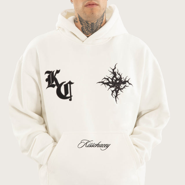 Model wears Paragons Relaxed Hoodie in Natural White Hoodies in White - Image 4