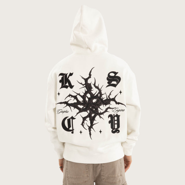 Model wears Paragons Relaxed Hoodie in Natural White Hoodies in White - Image 2