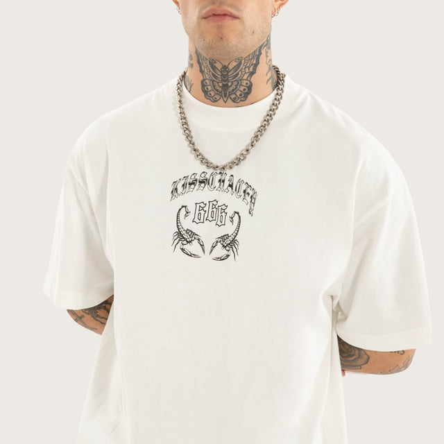 Model wears Sacrifice Street Tee Natural White T-Shirts in White - Image 3