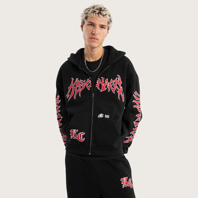 Model wears Razor Zip Through Hoodie Jet Black Hoodies in Black - Image 1