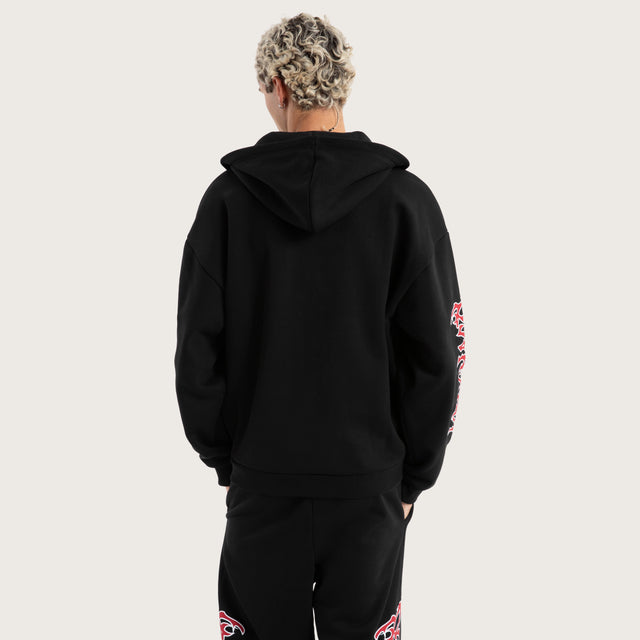 Model wears Razor Zip Through Hoodie Jet Black Hoodies in Black - Image 2