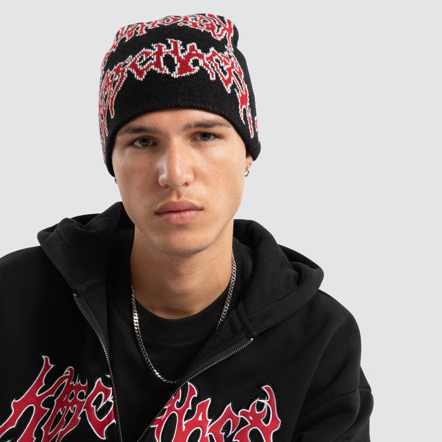 Model wears Razor Skully Beanie Jet Black Accessories in Black - Image 4