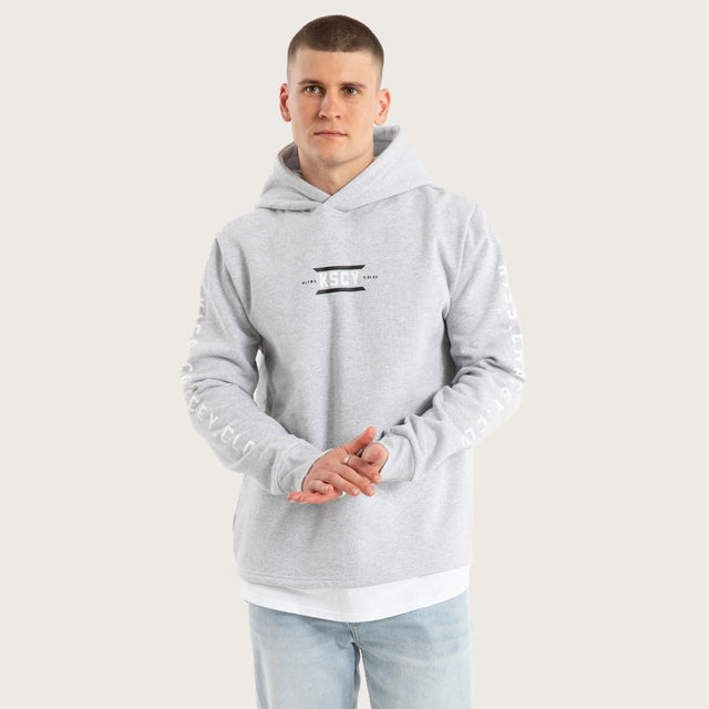 Model wears Trace Layered Hoodie Grey Marle Hoodies in Grey - Image 3