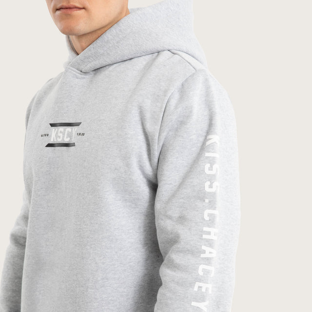 Model wears Trace Layered Hoodie Grey Marle Hoodies in Grey - Image 4
