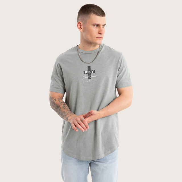 Model wears Resolved Dual Curved Tee Pigment Limestone T-Shirts in Grey - Image 4