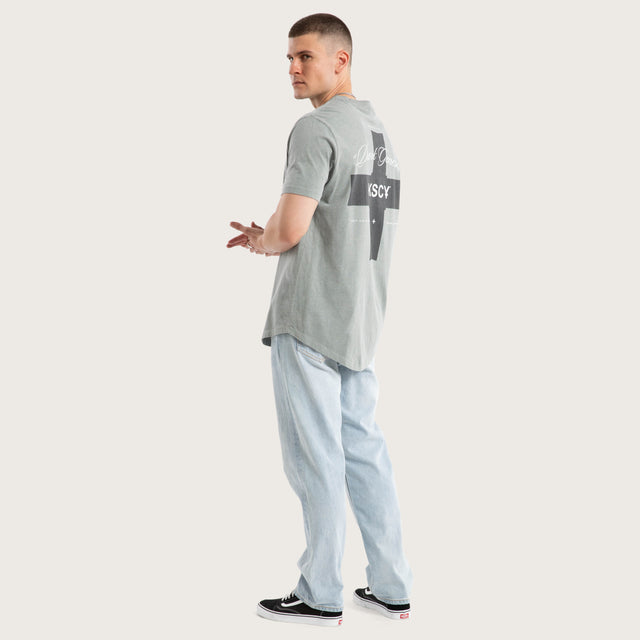 Model wears Resolved Dual Curved Tee Pigment Limestone T-Shirts in Grey - Image 6