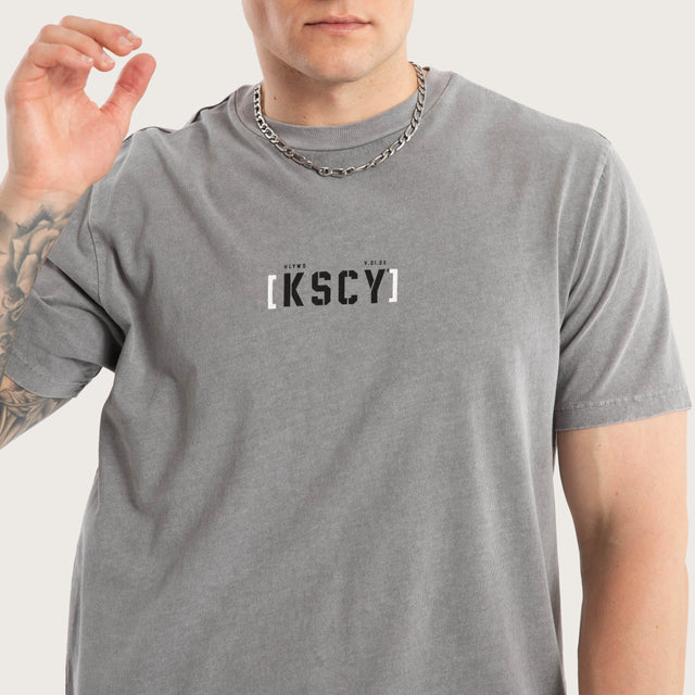 Model wears Unleashed Dual Curved Tee Pigment Frost Grey T-Shirts in Grey - Image 4