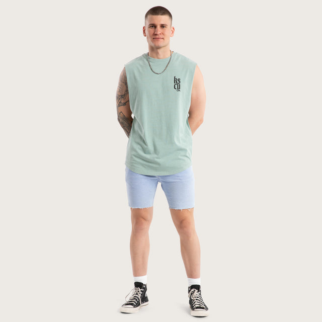 Model wears Thrillify Dual Curved Muscle Pigment Blue Surf Muscle Tees in Blue - Image 2