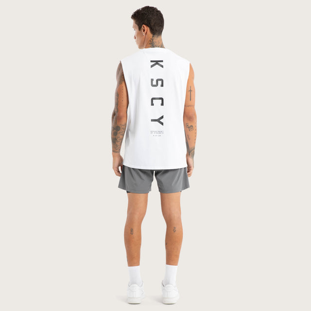 Model wears Vigor Split Hem Muscle Optical White Muscle Tees in White - Image 2
