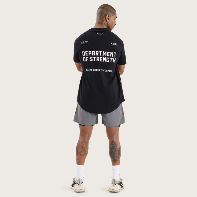 Model wears Venture Raglan Dual Curved Tee Jet Black T-Shirts in Black - Image 7