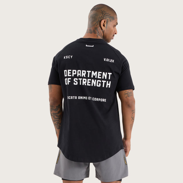 Model wears Venture Raglan Dual Curved Tee Jet Black T-Shirts in Black - Image 4