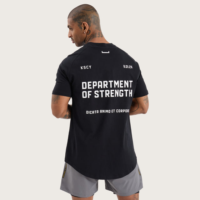 Model wears Venture Raglan Dual Curved Tee Jet Black T-Shirts in Black - Image 1
