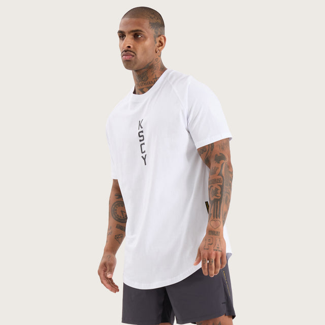 Model wears Venture Raglan Dual Curved Tee Optical White T-Shirts in White - Image 2