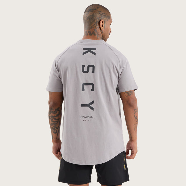 Model wears Rapid Raglan Dual Curved Tee Alloy T-Shirts in Grey - Image 7