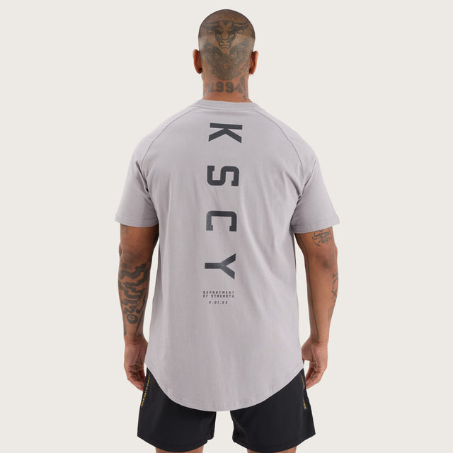 Model wears Rapid Raglan Dual Curved Tee Alloy T-Shirts in Grey - Image 2