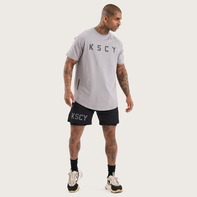 Model wears Rapid Raglan Dual Curved Tee Alloy T-Shirts in Grey - Image 3