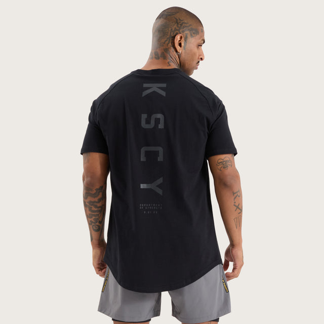Model wears Rapid Raglan Dual Curved Tee Jet Black T-Shirts in Black - Image 1