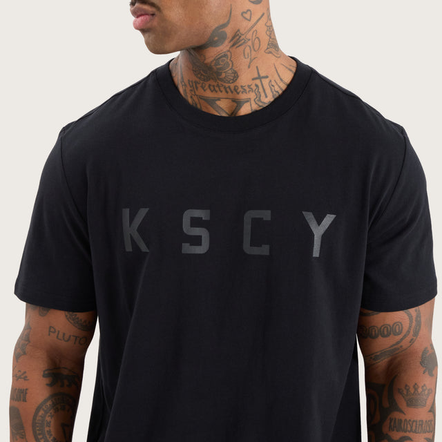 Model wears Glide Active Tee Jet Black T-Shirts in Black - Image 3