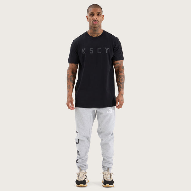 Model wears Glide Active Tee Jet Black T-Shirts in Black - Image 6