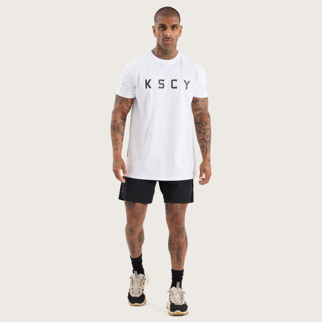 Model wears Glide Active Tee Optical White T-Shirts in White - Image 6