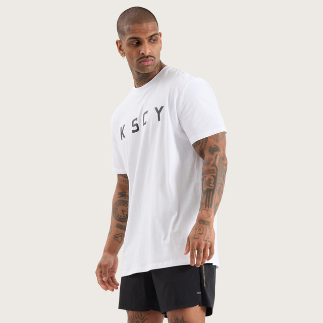 Model wears Glide Active Tee Optical White T-Shirts in White - Image 2