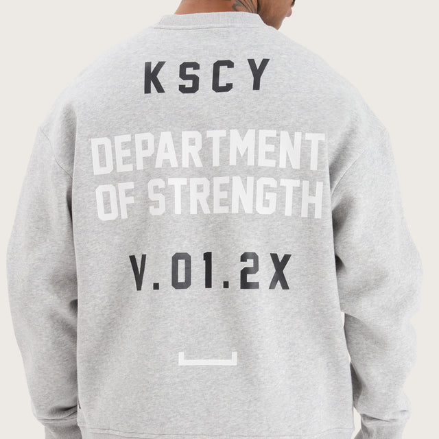 Model wears Epic Relaxed Sweater Grey Marle Jumpers in Grey - Image 4