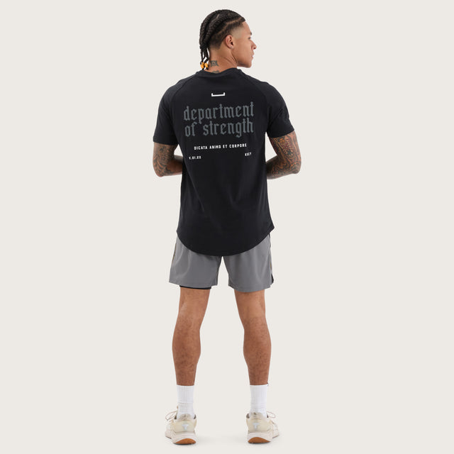 Model wears Apex Raglan Dual Curved Tee DOS Black T-Shirts in Black - Image 5