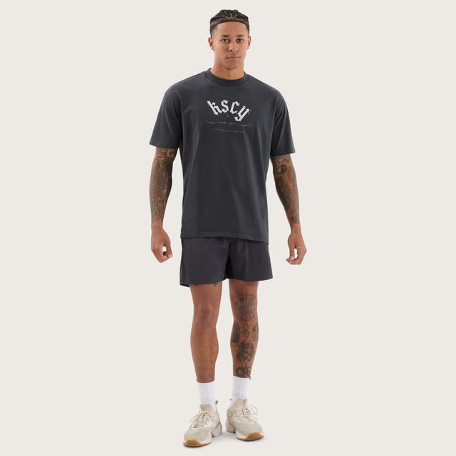 Model wears Forge Box Fit Tee Pigment Black T-Shirts in Black - Image 4