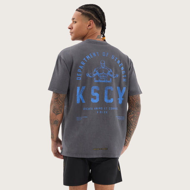 Model wears Stride Box Fit Tee Pigment Asphalt T-Shirts in Grey - Image 1
