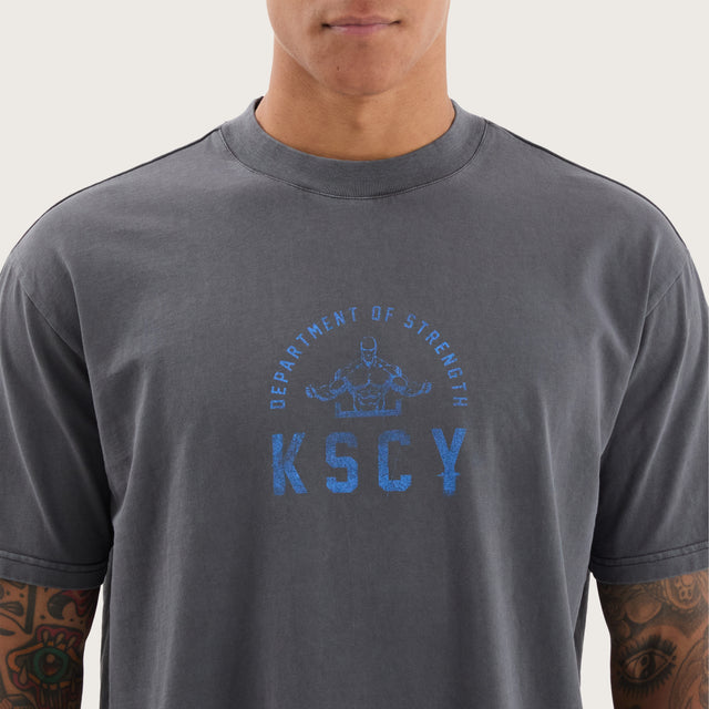 Model wears Stride Box Fit Tee Pigment Asphalt T-Shirts in Grey - Image 3
