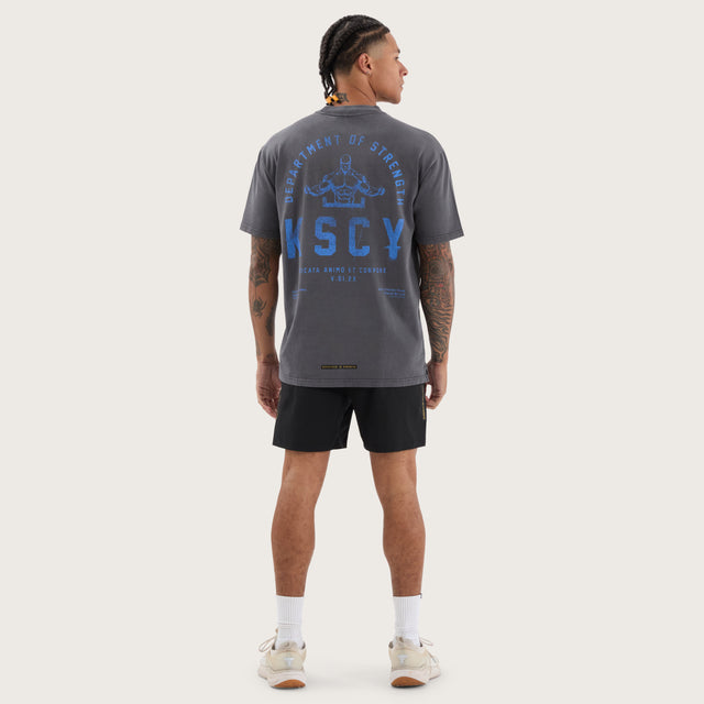 Model wears Stride Box Fit Tee Pigment Asphalt T-Shirts in Grey - Image 5