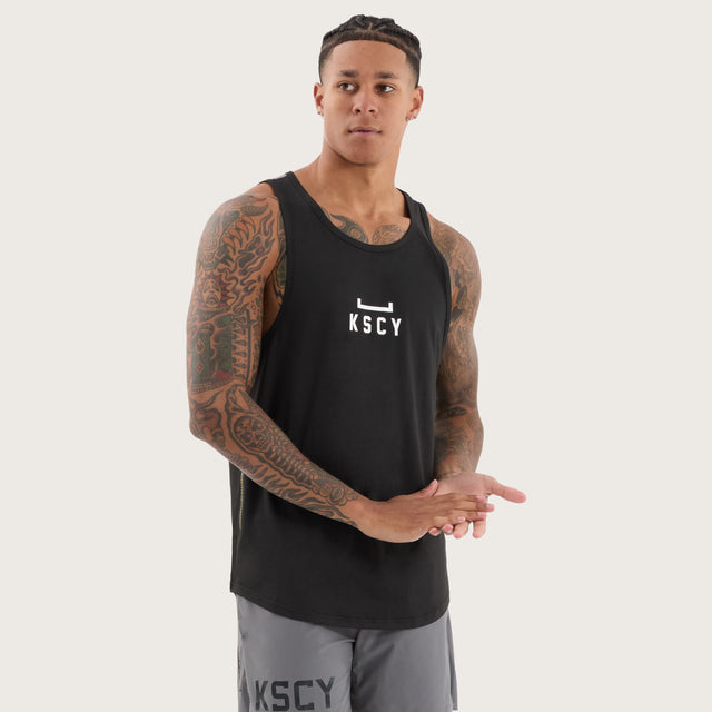 Model wears Bolster Curved Hem Active Tank Black/Asphalt Muscle Tees in Black - Image 5