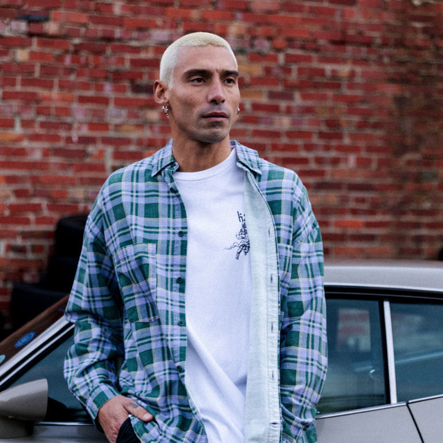 Model wears Craigton Drop Shoulder Shirt Moss Green Check Long Sleeve Shirts in Green - Image 2