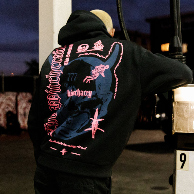 Model wears Witchcraft Oversized Hoodie Jet Black Hoodies in Black - Image 3