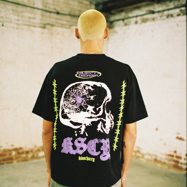 Model wears Disorder Street Tee Anthracite T-Shirts in Black - Image 2