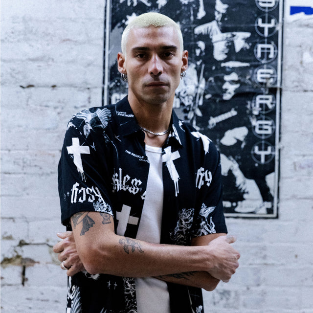 Model wears Blackford Relaxed Shirt Cross Angel Print Short Sleeve Shirts in Black - Image 2