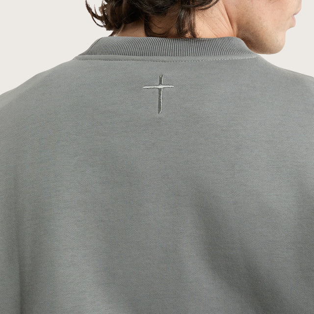Model wears Medora Relaxed Sweater Pigment Ultimate Grey Jumpers in Grey - Image 3