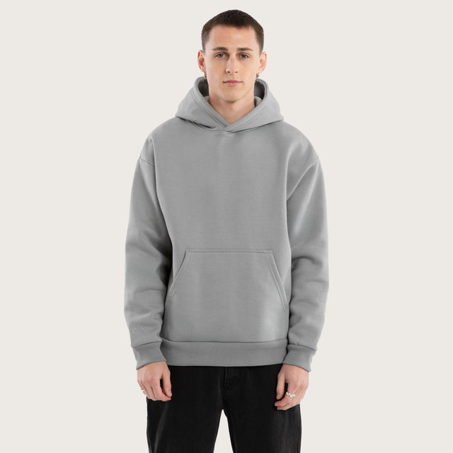 Model wears Weyburn Relaxed Hoodie Pigment Ultimate Grey Hoodies in Grey - Image 1
