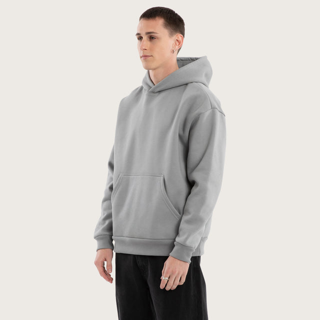 Model wears Weyburn Relaxed Hoodie Pigment Ultimate Grey Hoodies in Grey - Image 3
