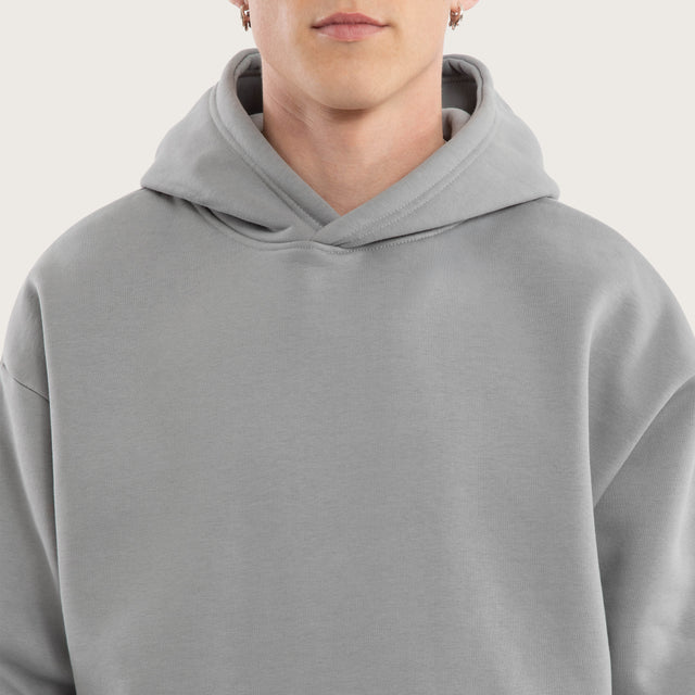 Model wears Weyburn Relaxed Hoodie Pigment Ultimate Grey Hoodies in Grey - Image 6