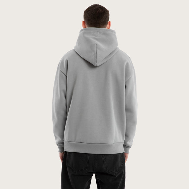 Model wears Weyburn Relaxed Hoodie Pigment Ultimate Grey Hoodies in Grey - Image 4