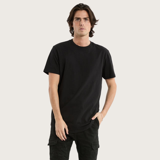 Model wears Prairie Dual Curved Tee Jet Black T-Shirts in Black - Image 1