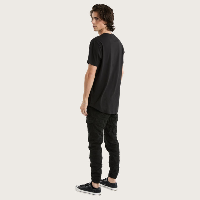 Model wears Prairie Dual Curved Tee Jet Black T-Shirts in Black - Image 5