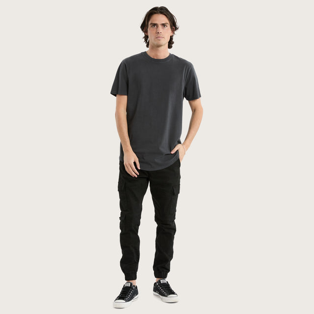 Model wears Prairie Dual Curved Tee Pigment Asphalt T-Shirts in Grey - Image 2