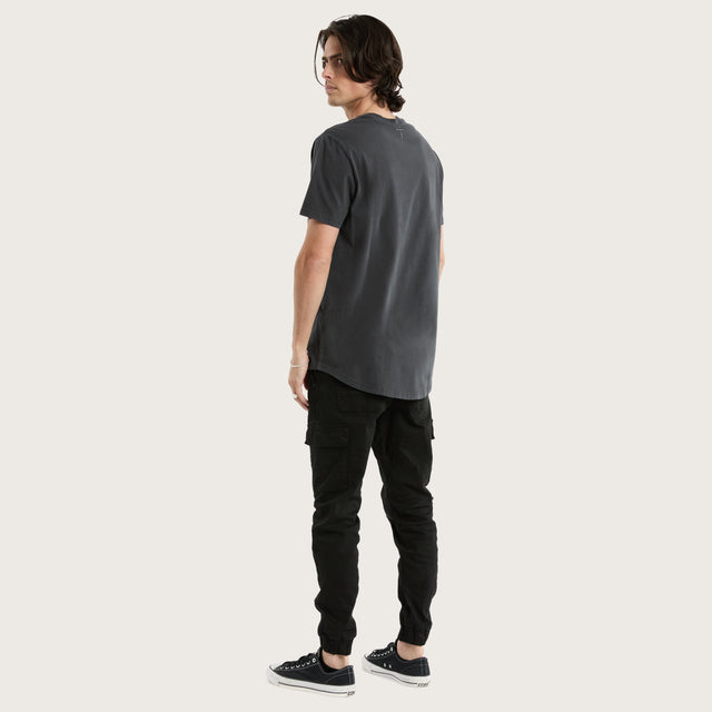 Model wears Prairie Dual Curved Tee Pigment Asphalt T-Shirts in Grey - Image 5