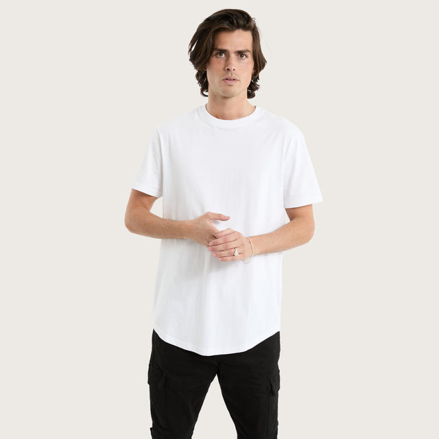 Model wears Prairie Dual Curved Tee Optical White T-Shirts in White - Image 1